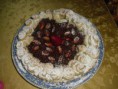 Torta di pasta sfoglia con crema al cioccolato fondente e mandorle caramellate